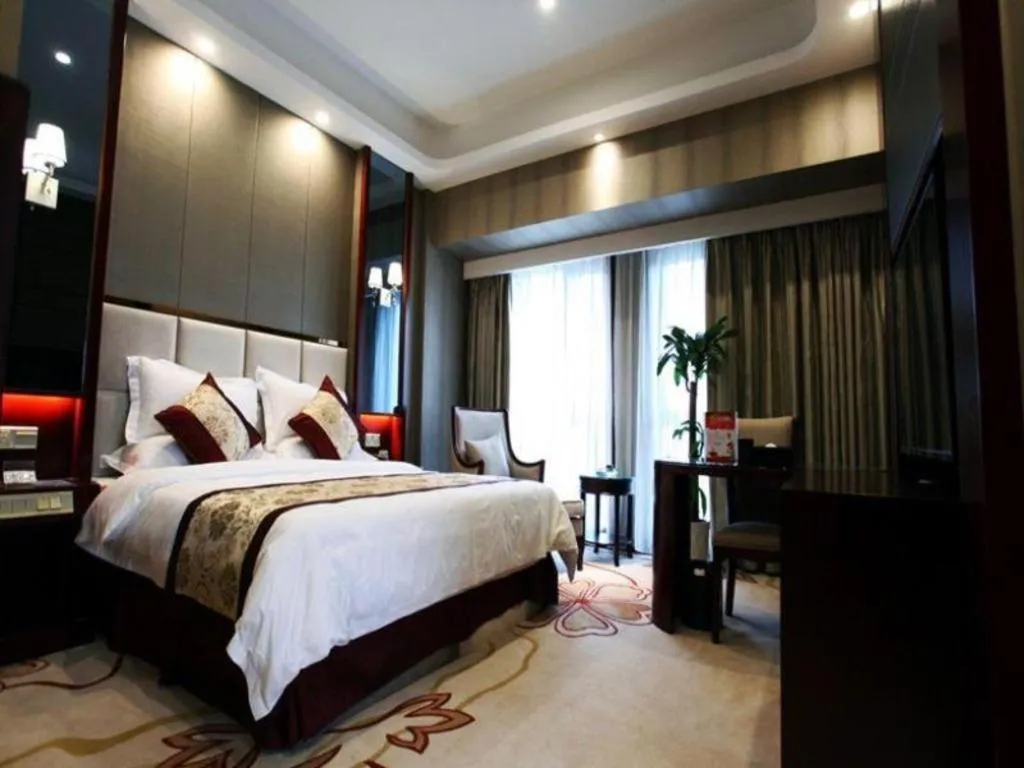 Bed in GreenTree Eastern Zigong Huashang International City Huichuan Road Hotel