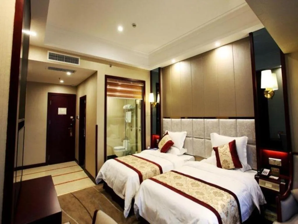 Bed in GreenTree Eastern Zigong Huashang International City Huichuan Road Hotel