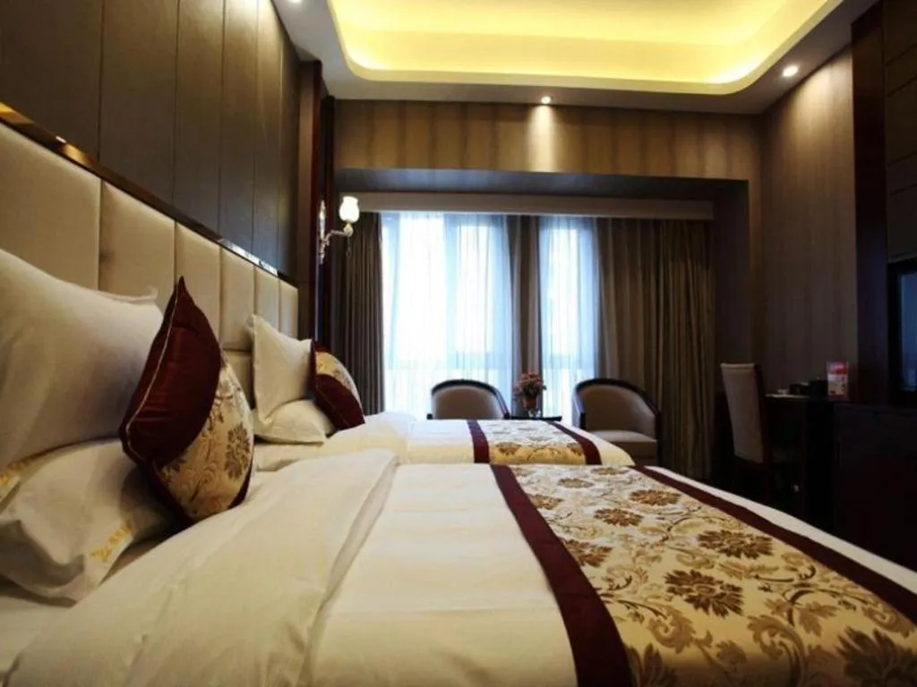 Bed in GreenTree Eastern Zigong Huashang International City Huichuan Road Hotel