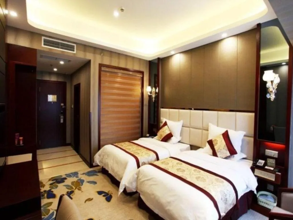 Bed in GreenTree Eastern Zigong Huashang International City Huichuan Road Hotel