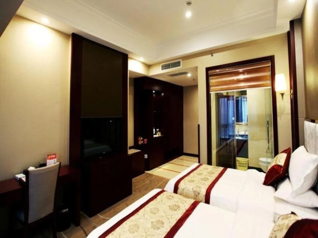 Bed in GreenTree Eastern Zigong Huashang International City Huichuan Road Hotel