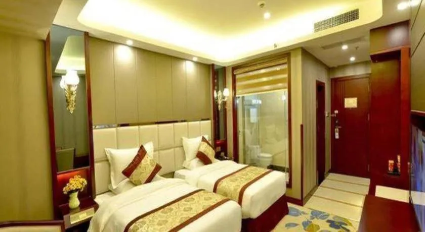Bed in GreenTree Eastern Zigong Huashang International City Huichuan Road Hotel