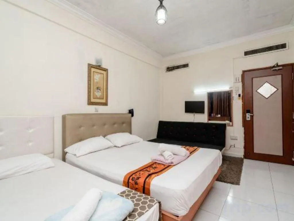 Bed in Lai Ming Hotel Cosmoland