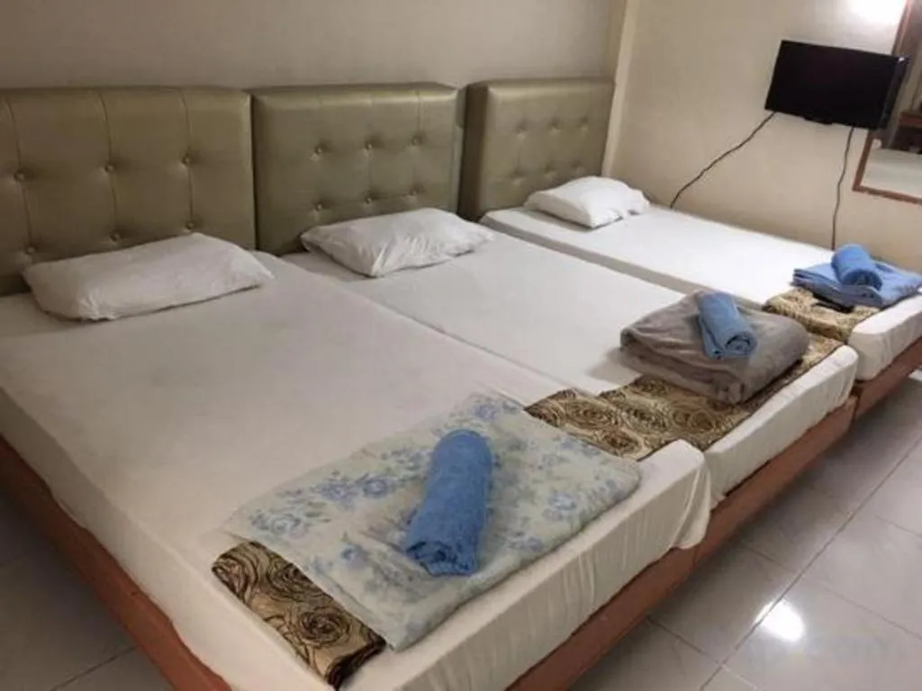 Bed in Lai Ming Hotel Cosmoland