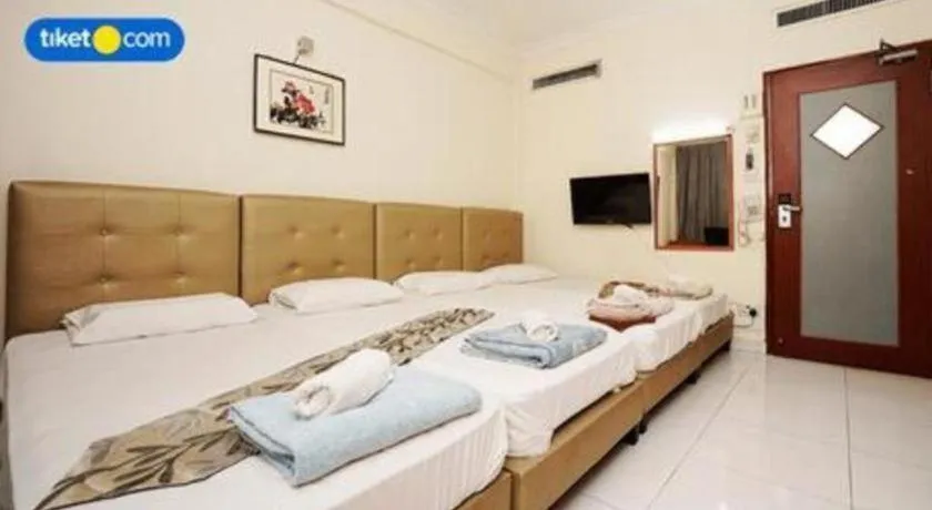 Bed in Lai Ming Hotel Cosmoland