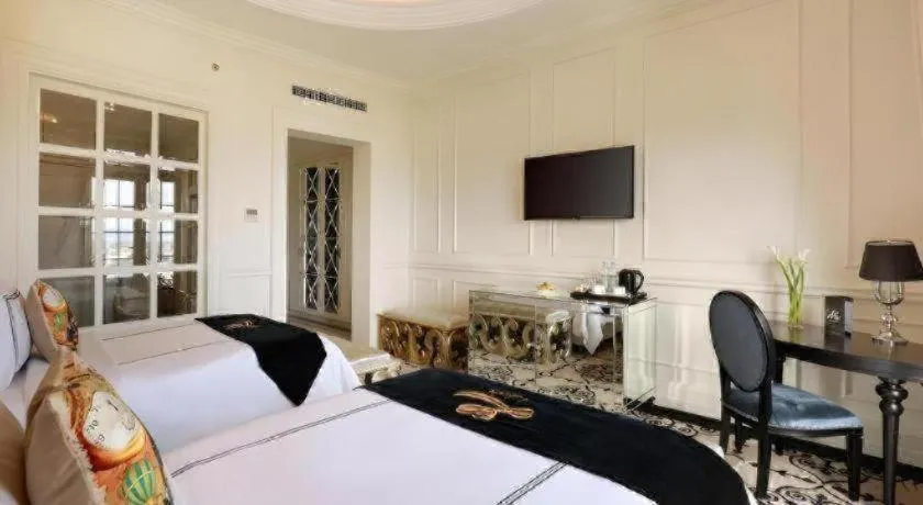 Bed in Lafayette Boutique Hotel