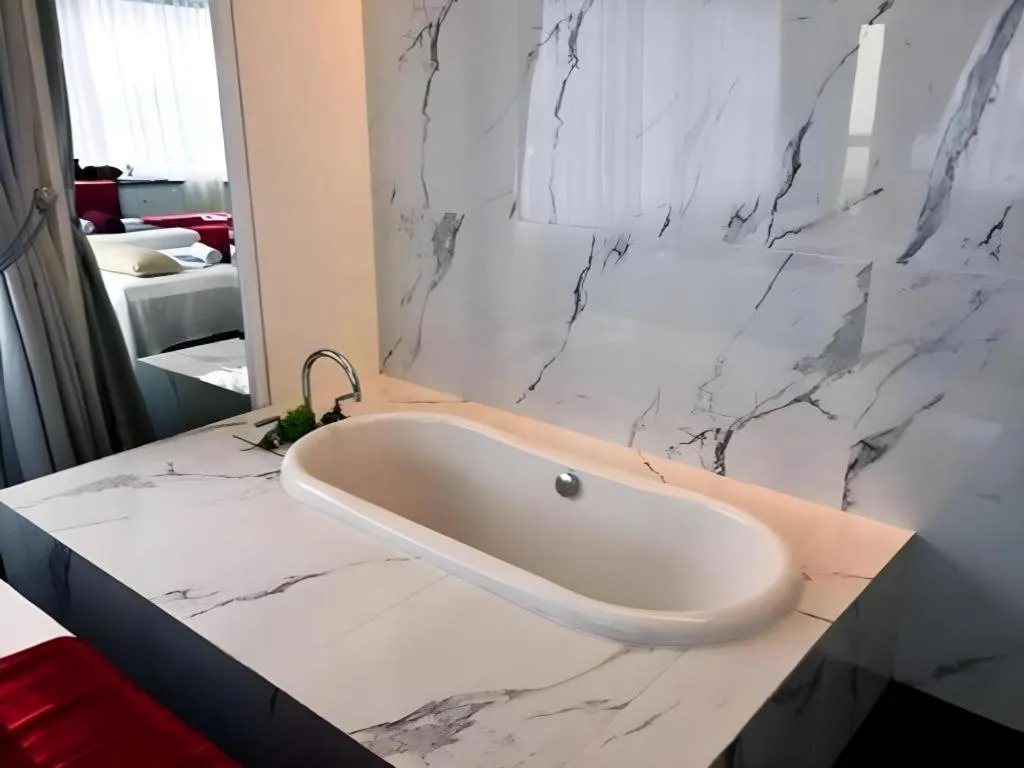 Bed in Lafayette Boutique Hotel