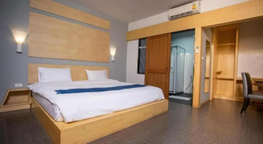 Bed in NH Elegant Hotel