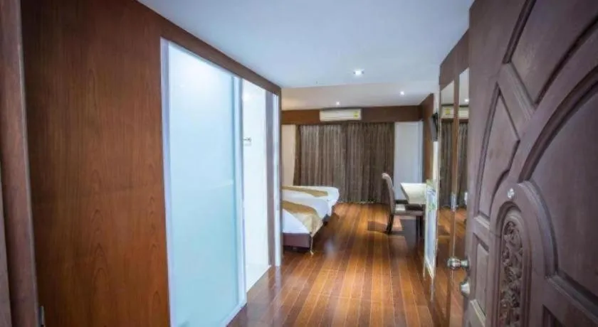 Bed in NH Elegant Hotel