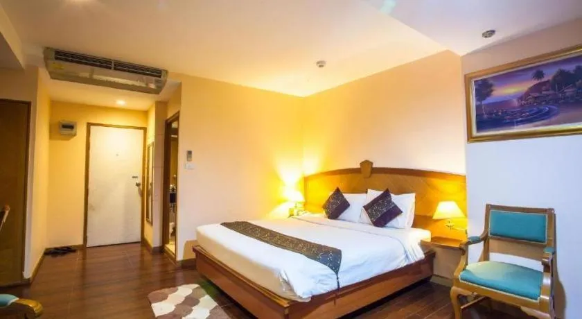 Bed in NH Elegant Hotel