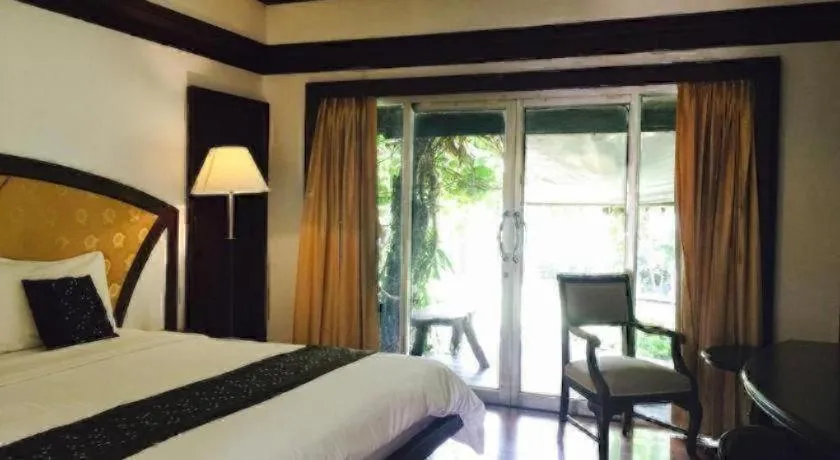 Bed in NH Elegant Hotel