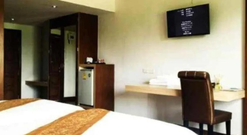 Bed in NH Elegant Hotel