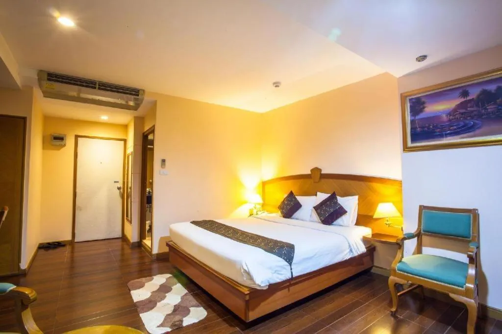 Bed in NH Elegant Hotel