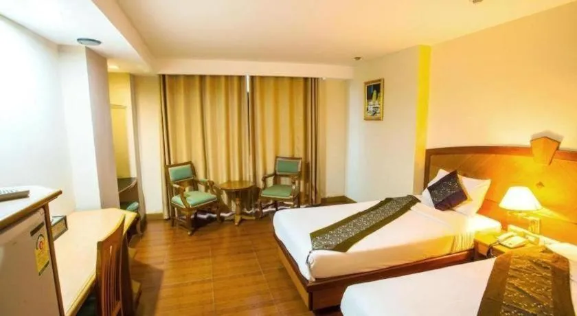 Bed in NH Elegant Hotel