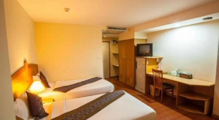 Bed in NH Elegant Hotel