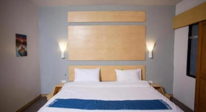 Bed in NH Elegant Hotel