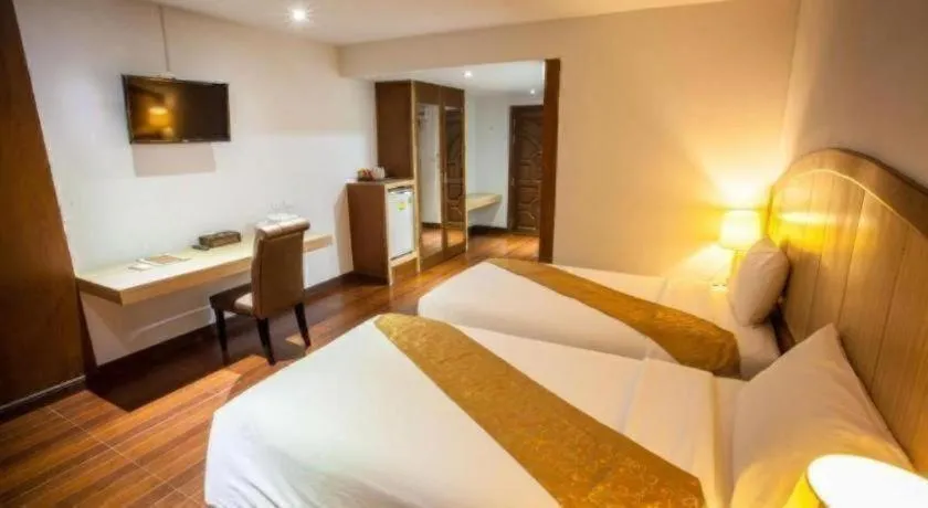 Bed in NH Elegant Hotel