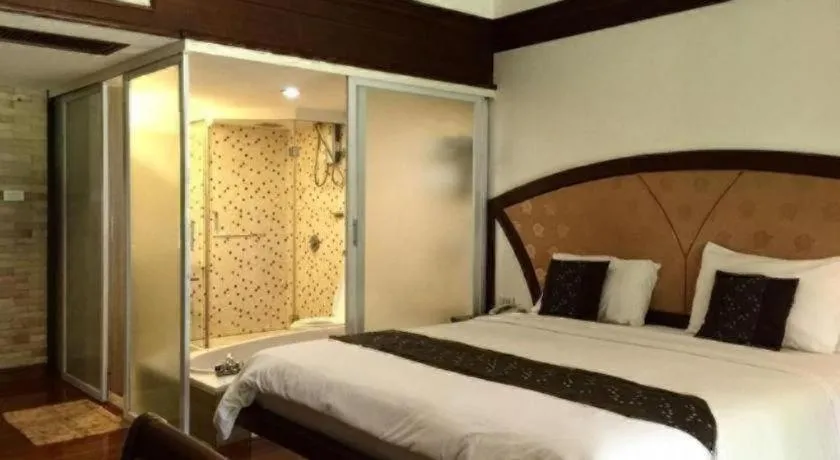 Bed in NH Elegant Hotel