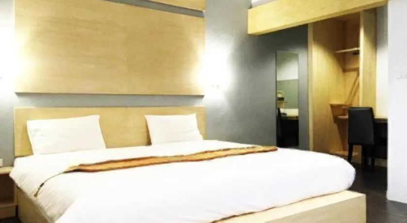 Bed in NH Elegant Hotel