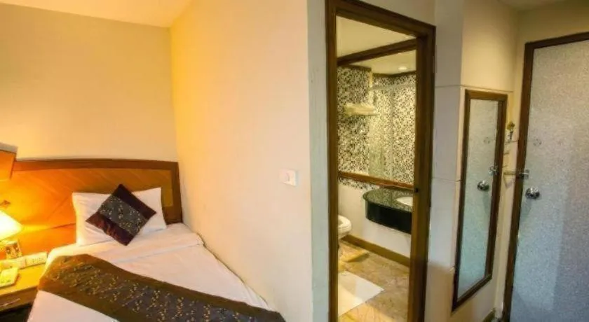 Bed in NH Elegant Hotel