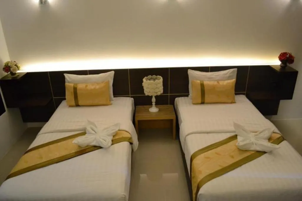 Bed in The Convenience Hotel