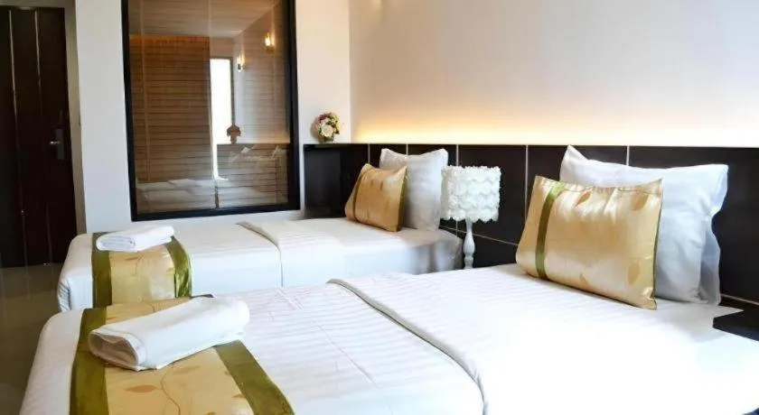 Bed in The Convenience Hotel