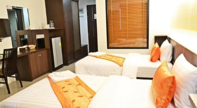 Bed in The Convenience Hotel