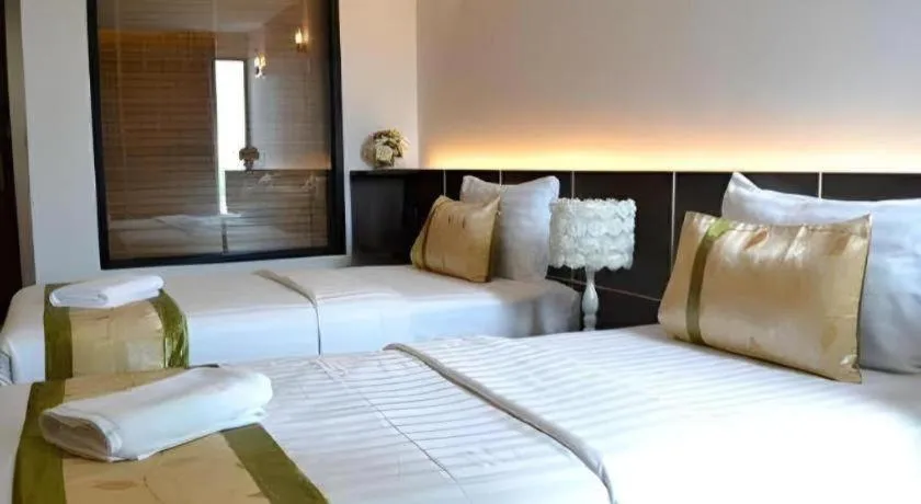 Bed in The Convenience Hotel