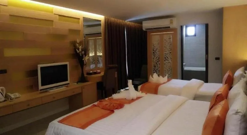 Bed in The Convenience Hotel