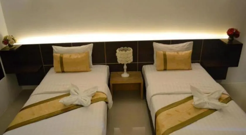 Bed in The Convenience Hotel