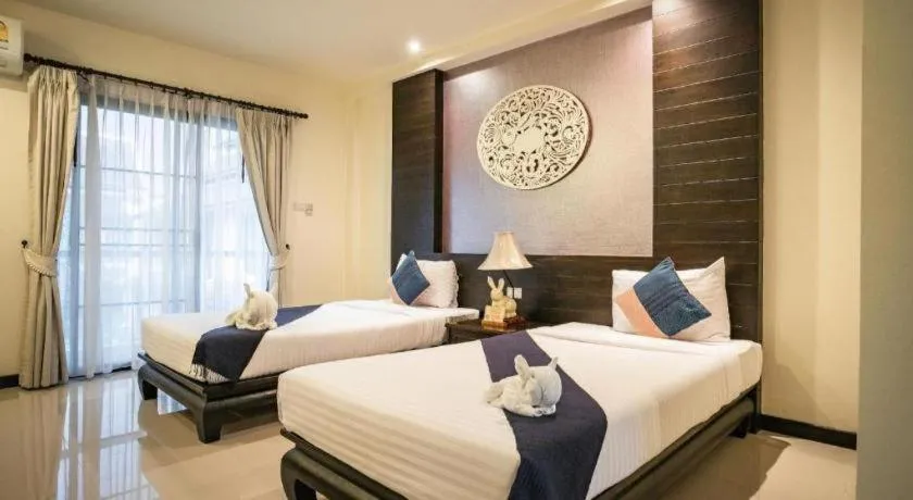 Bed in Wiangkaew Hotel