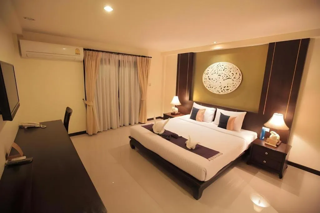 Bed in Wiangkaew Hotel