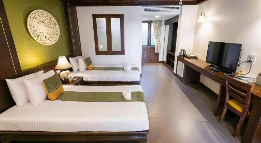 Bed in Wiangkaew Hotel