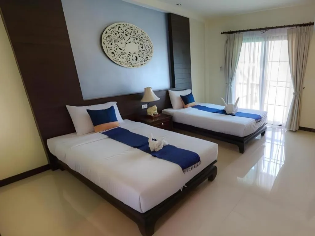 Bed in Wiangkaew Hotel