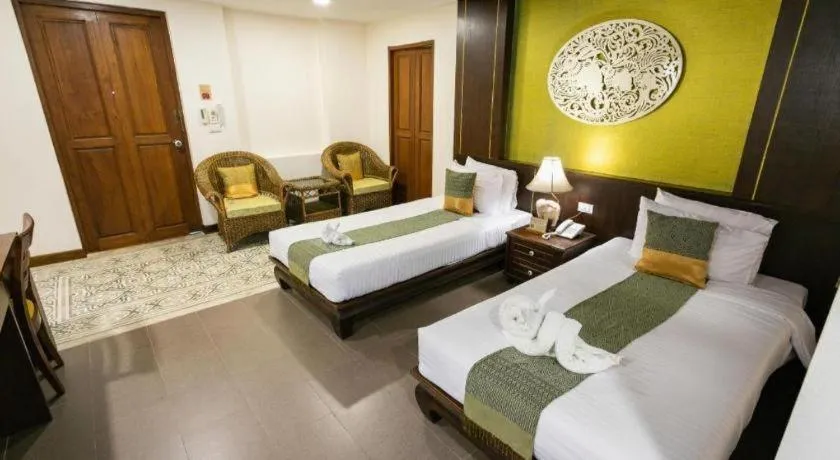 Bed in Wiangkaew Hotel