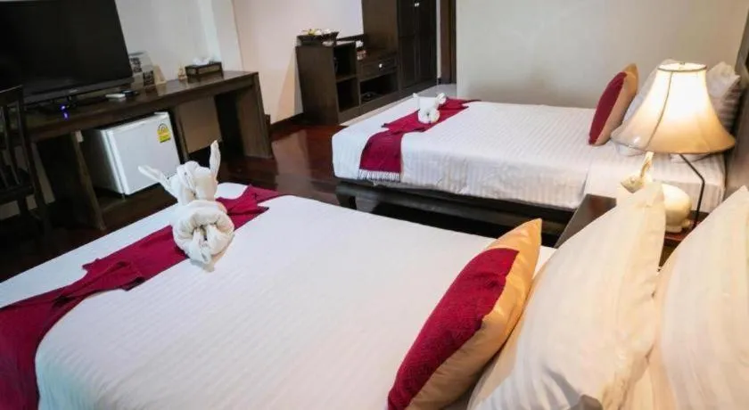 Bed in Wiangkaew Hotel