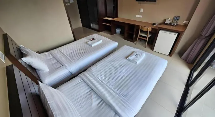Bed in Wsotel Hotel
