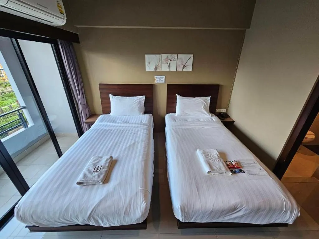 Bed in Wsotel Hotel