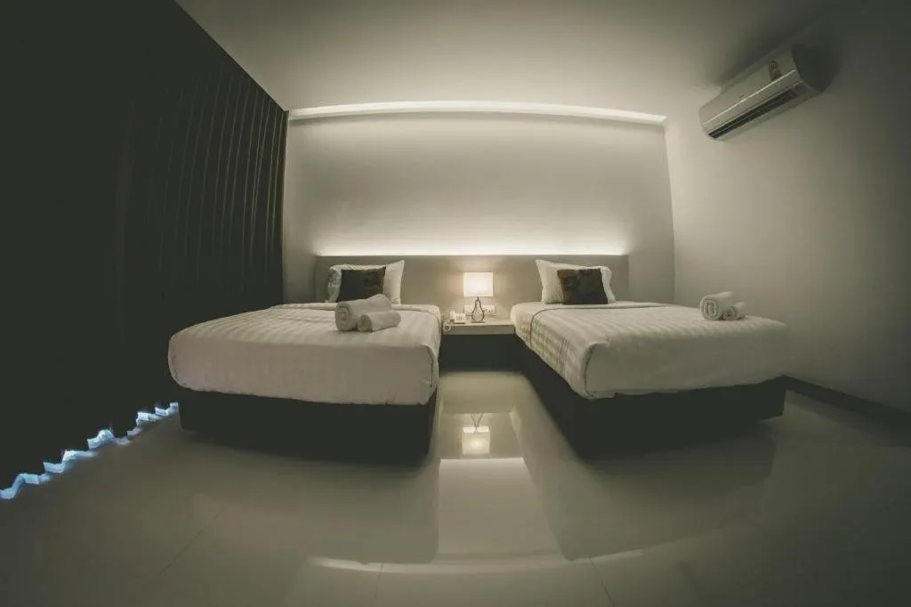 Bed in Chaisaeng Villa