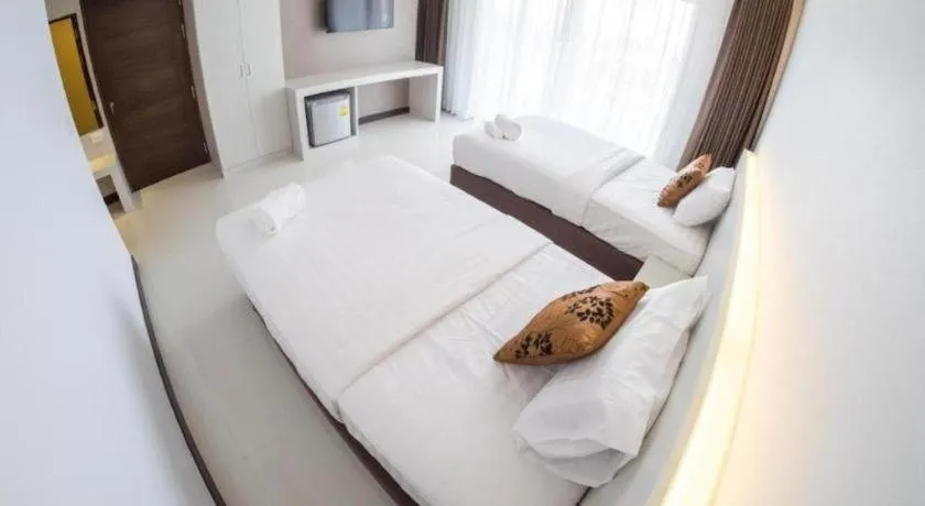 Bed in Chaisaeng Villa