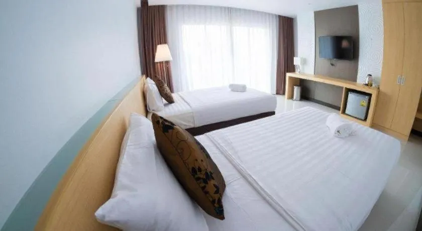 Bed in Chaisaeng Villa