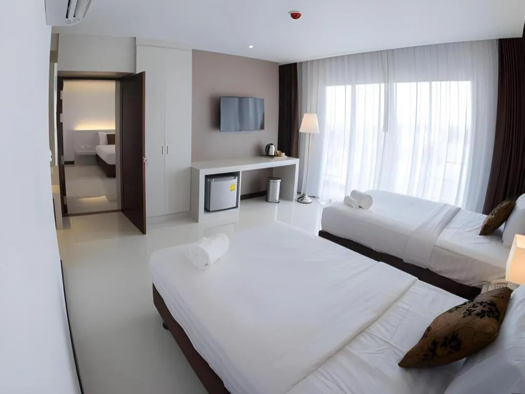 Bed in Chaisaeng Villa