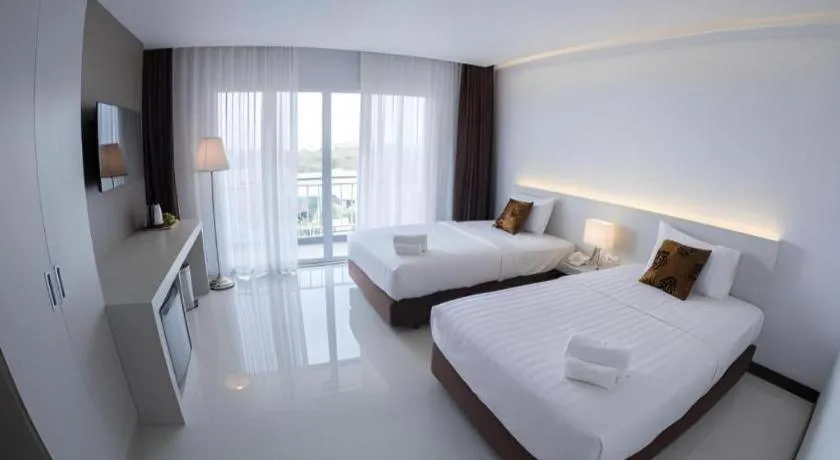 Bed in Chaisaeng Villa