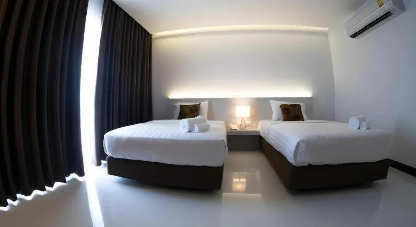 Bed in Chaisaeng Villa
