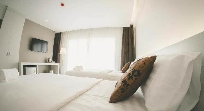 Bed in Chaisaeng Villa