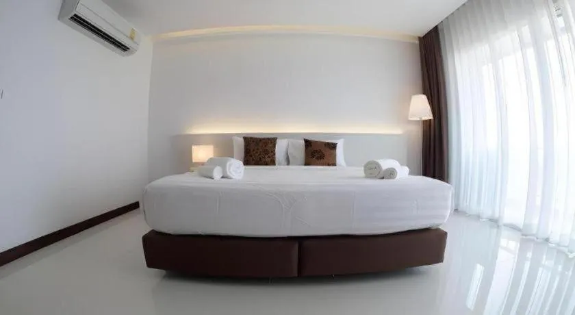 Bed in Chaisaeng Villa