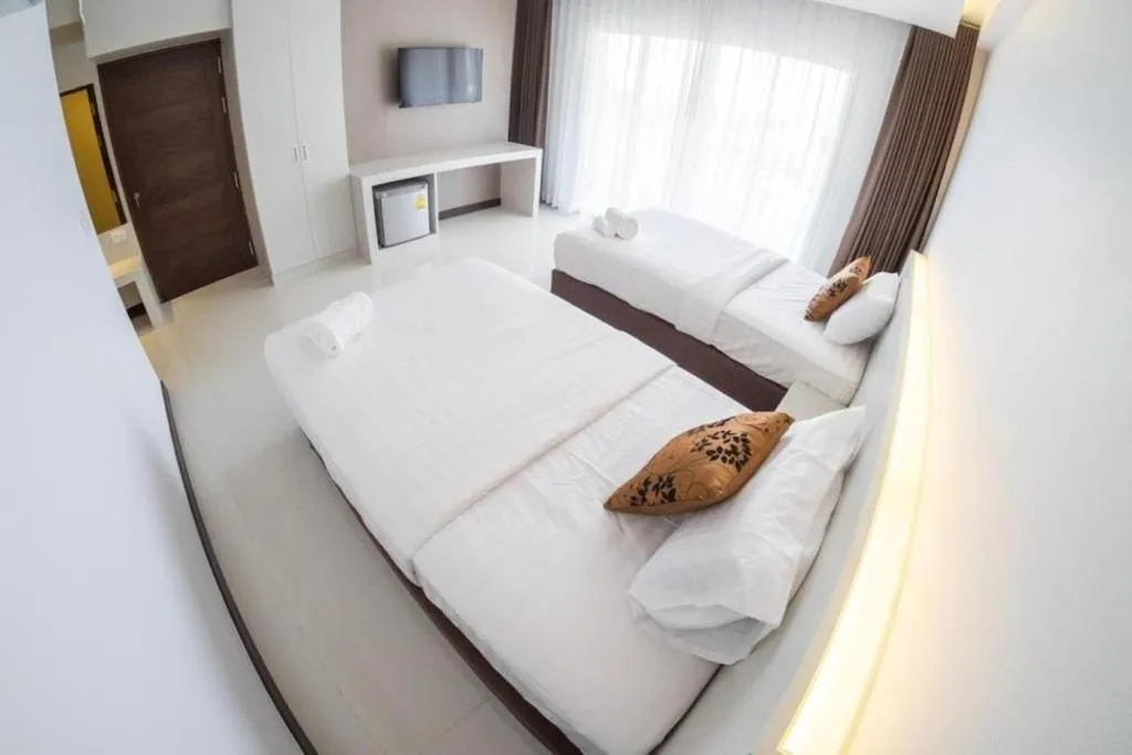 Bed in Chaisaeng Villa