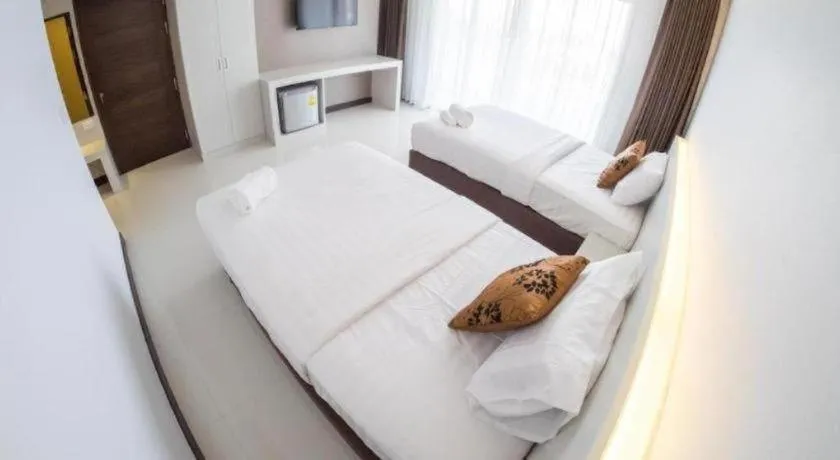 Bed in Chaisaeng Villa