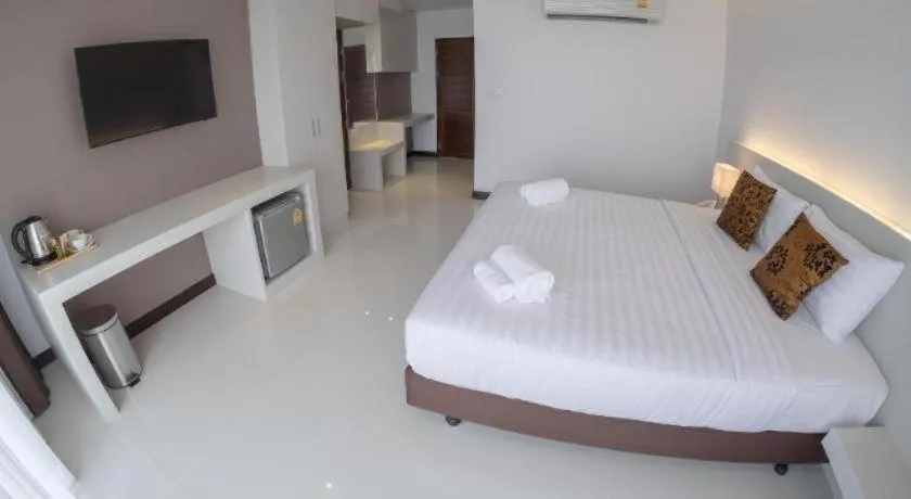 Bed in Chaisaeng Villa