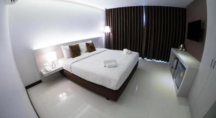 Bed in Chaisaeng Villa